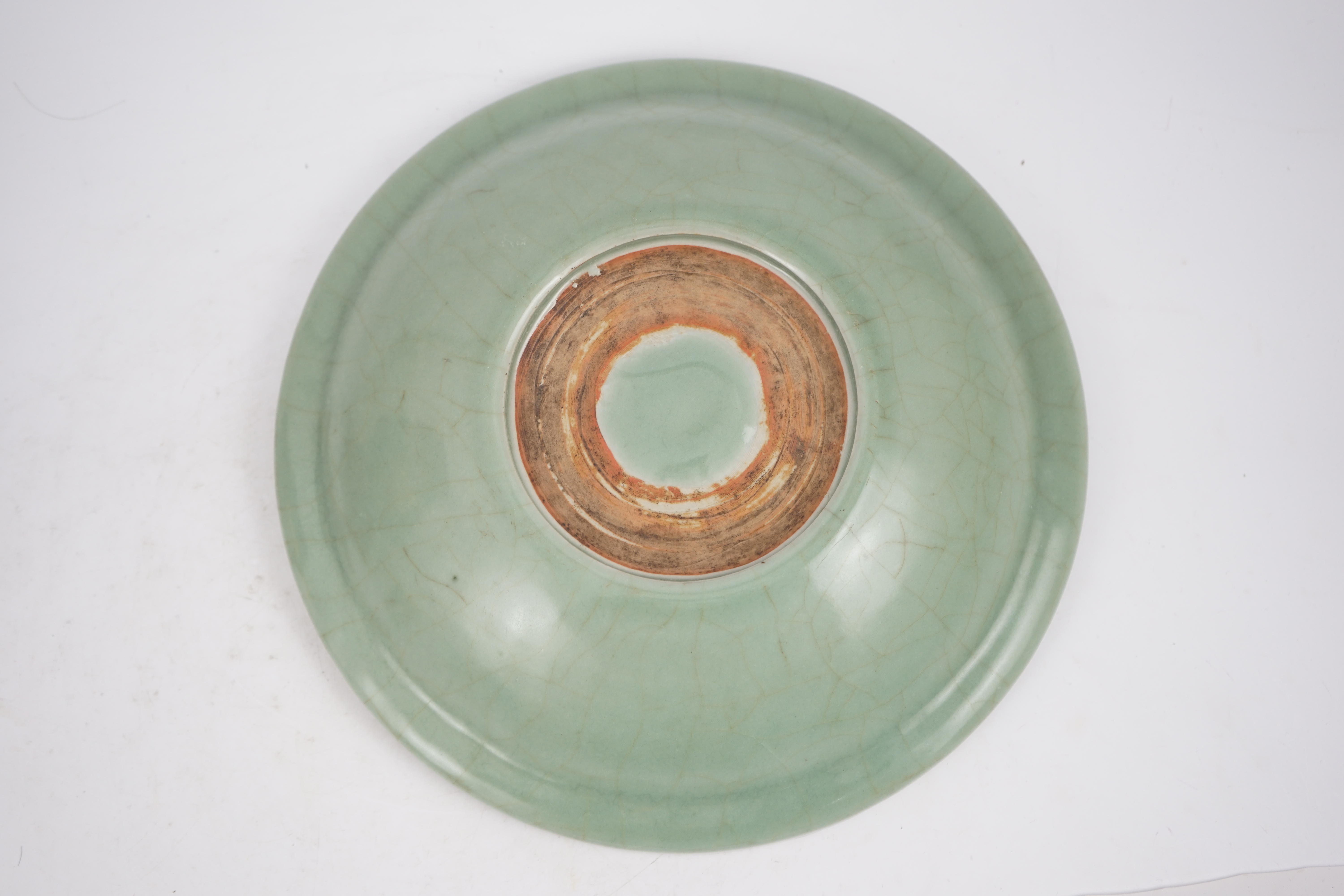 A Chinese Longquan celadon 'qilin' dish, 15th/16th century